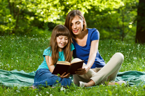 Mother and daughter reading a book